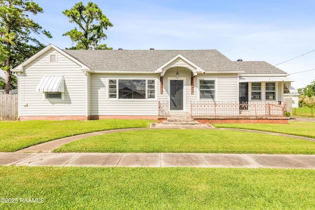 124 Taylor St, New Iberia, LA 70560 - view of front of house with roof with shingles