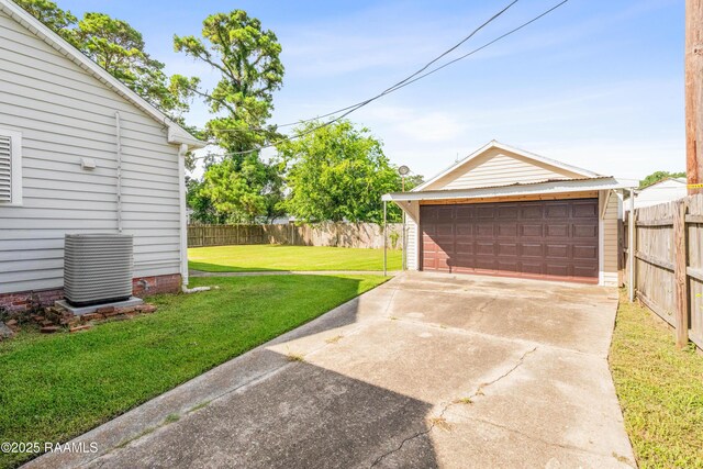 124 Taylor St, New Iberia, LA 70560 - view of yard with a detached garage and an outdoor structure