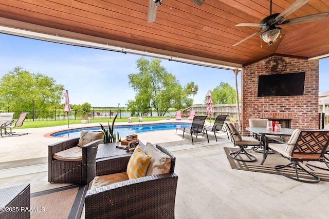 1181 Grand Loop, Breaux Bridge, LA 70517 - fenced backyard with a patio area, a ceiling fan, outdoor dining area, and an outdoor living space