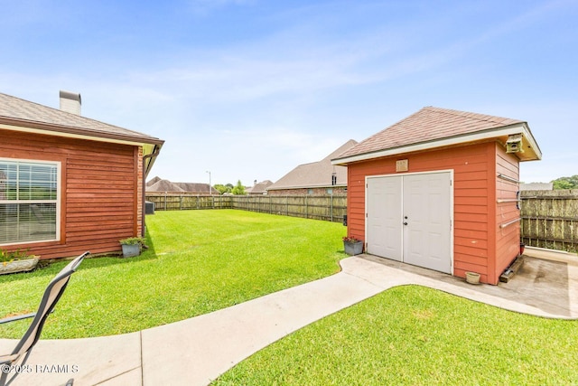 1181 Grand Loop, Breaux Bridge, LA 70517 - fenced backyard with a storage unit