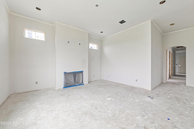 202 Keystone Dr, Scott, LA 70583 - unfurnished living room with ornamental molding and arched walkways