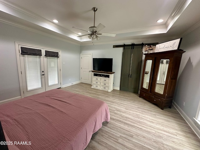 7421 W Congress St, Duson, LA 70529 - bedroom with a raised ceiling, crown molding, light wood-style flooring, french doors, and recessed lighting
