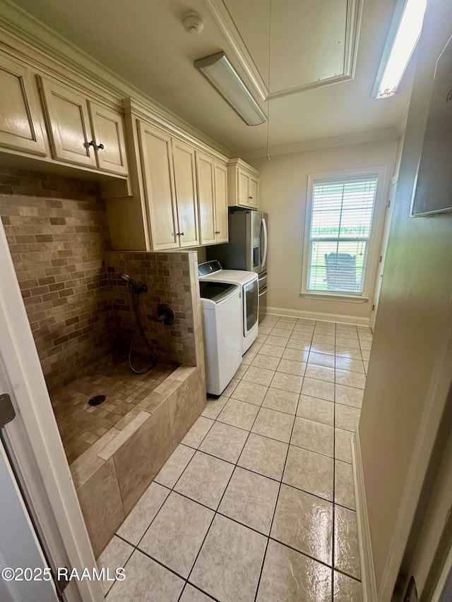 7421 W Congress St, Duson, LA 70529 - kitchen featuring light tile patterned floors, washing machine and clothes dryer, crown molding, tasteful backsplash, and light countertops