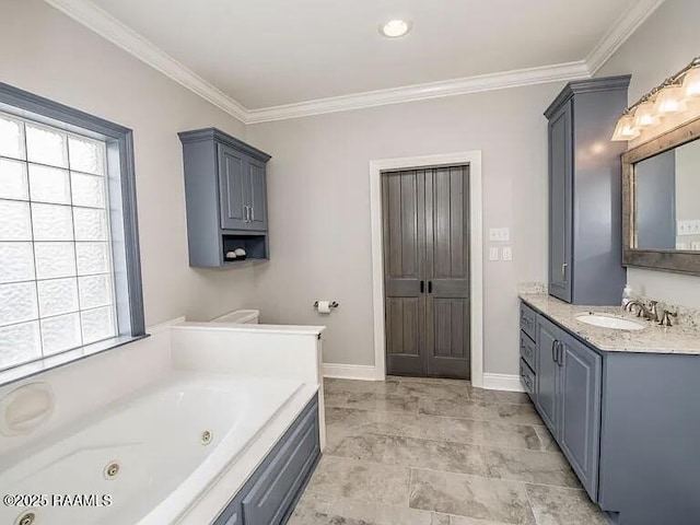 7421 W Congress St, Duson, LA 70529 - bathroom featuring plenty of natural light, vanity, a jetted tub, and ornamental molding