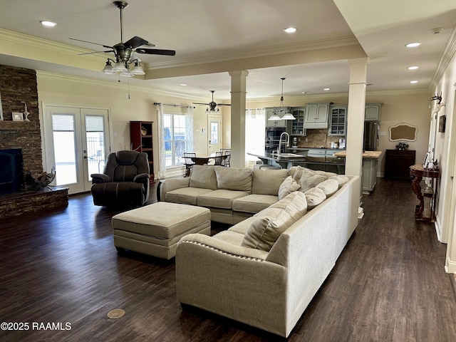 7421 W Congress St, Duson, LA 70529 - living room with ornate columns, a ceiling fan, dark wood-style floors, ornamental molding, and recessed lighting