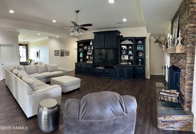 7421 W Congress St, Duson, LA 70529 - living room featuring a ceiling fan, dark wood-style flooring, a fireplace, crown molding, and recessed lighting