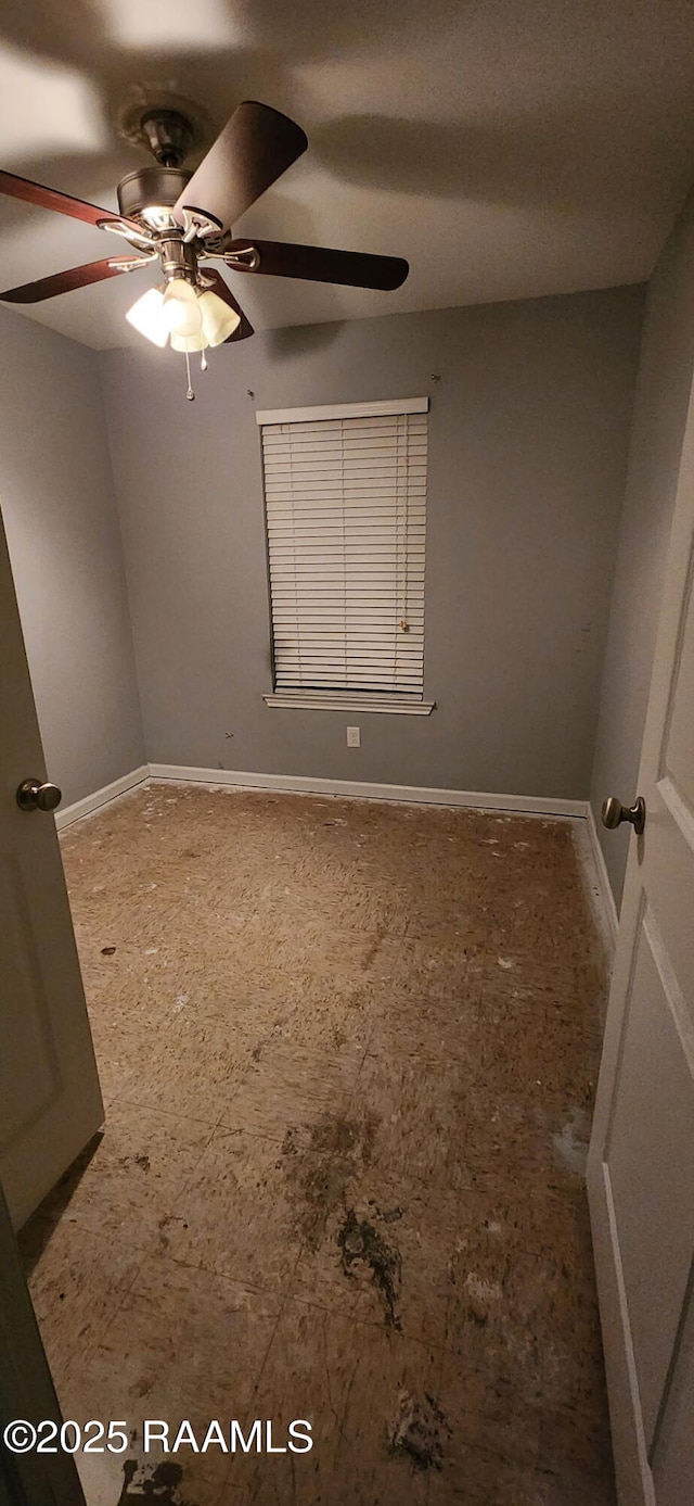 217 Marie St, Scott, LA 70583 - spare room with baseboards and ceiling fan
