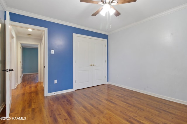1034 Hollow Oaks Rd, Breaux Bridge, LA 70517 - unfurnished bedroom with a closet, wood finished floors, ornamental molding, and ceiling fan