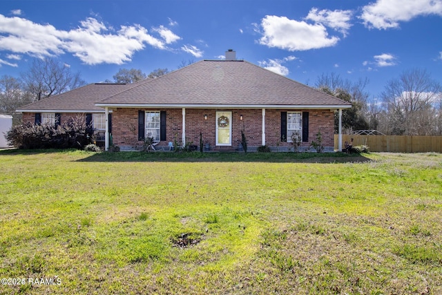 1034 Hollow Oaks Rd, Breaux Bridge, LA 70517 - view of front of property featuring brick siding, a chimney, and roof with shingles