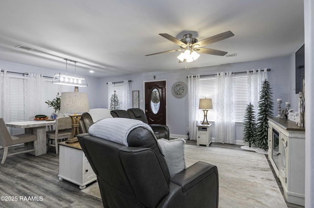 411 Donald St, New Iberia, LA 70563 - living area featuring a ceiling fan and wood finished floors