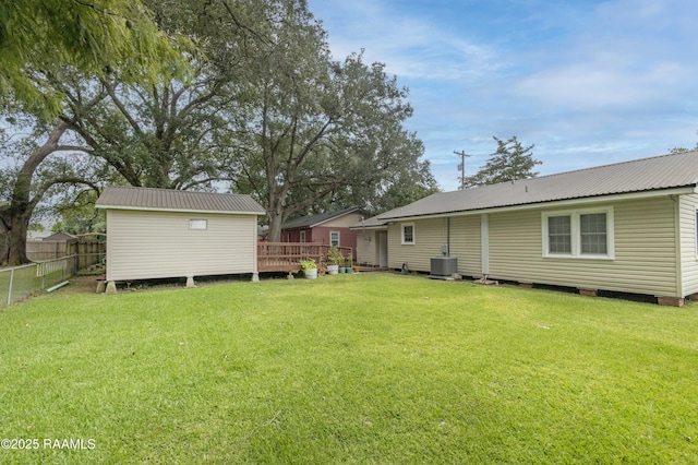 411 Donald St, New Iberia, LA 70563 - view of yard featuring a deck and an outdoor structure