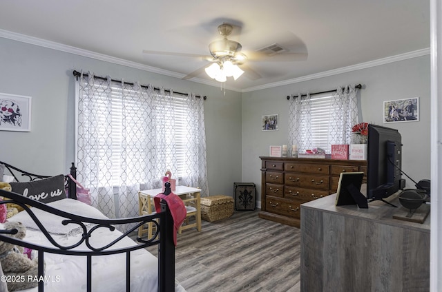 411 Donald St, New Iberia, LA 70563 - bedroom with wood finished floors, crown molding, and a ceiling fan