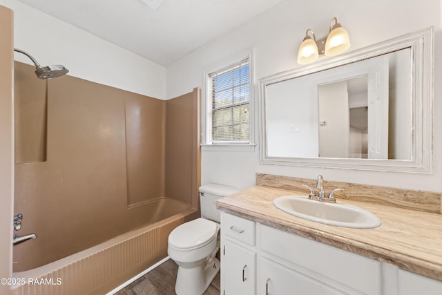 3317 Walnut Dr, Opelousas, LA 70570 - bathroom featuring vanity, shower / bathtub combination, and wood finished floors