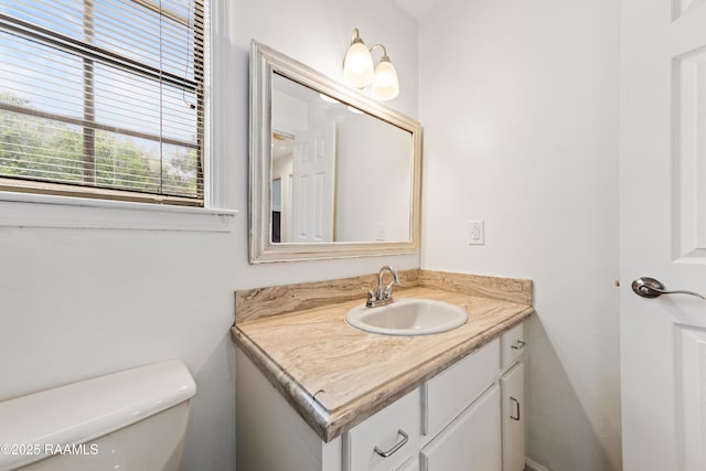 3317 Walnut Dr, Opelousas, LA 70570 - half bathroom featuring vanity and toilet