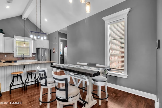 103 Cane Creek Dr, Broussard, LA 70518 - dining space with dark wood-style flooring and baseboards