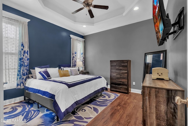 103 Cane Creek Dr, Broussard, LA 70518 - bedroom featuring wood finished floors, multiple windows, a raised ceiling, ornamental molding, and recessed lighting