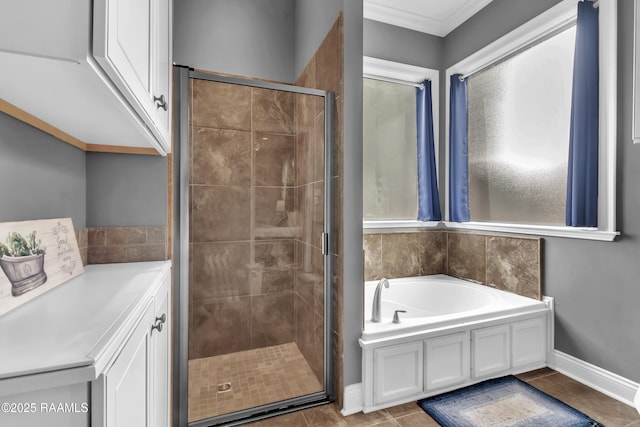 103 Cane Creek Dr, Broussard, LA 70518 - full bathroom with a garden tub, a stall shower, tile patterned floors, and ornamental molding
