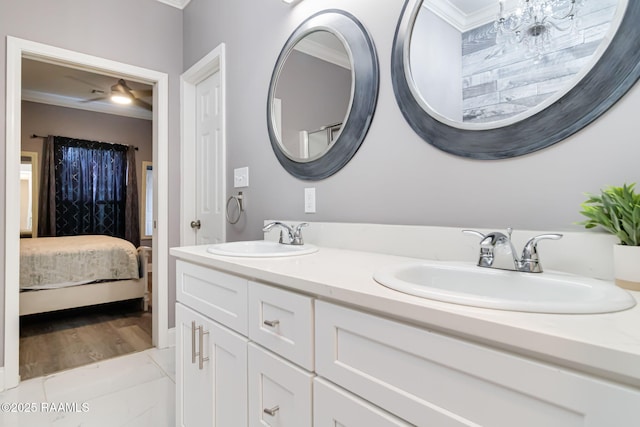 202 Saint Matthias Dr, Carencro, LA 70520 - ensuite bathroom featuring ornamental molding, double vanity, and ceiling fan