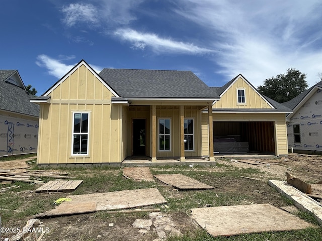 203 Fillmore Way, Lafayette, LA 70506 - property under construction featuring roof with shingles, board and batten siding, and an attached garage