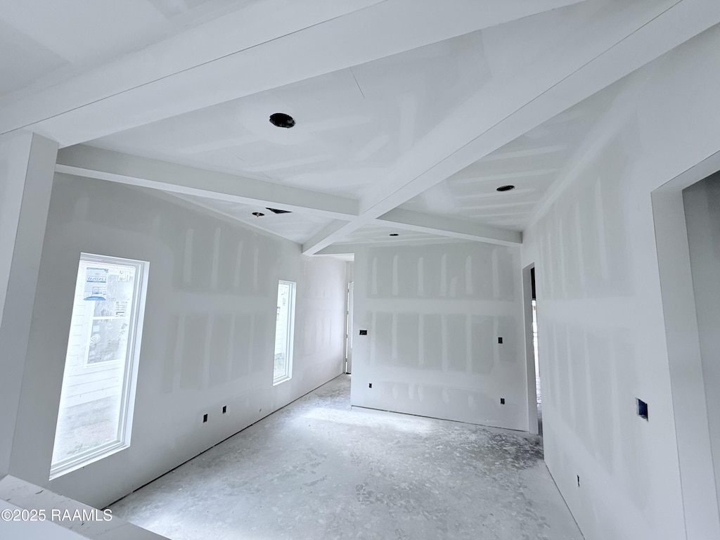 215 Berchman Oaks Dr, Lafayette, LA 70506 - unfurnished bedroom with multiple windows and beamed ceiling