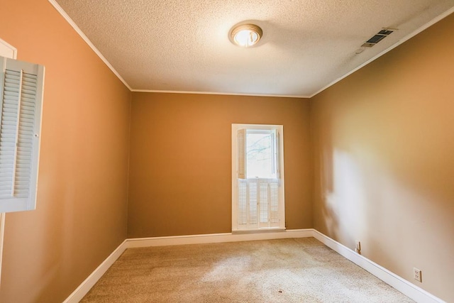 1867 N Old 179, Whigham, GA 39897 - spare room with ornamental molding, a textured ceiling, and light colored carpet