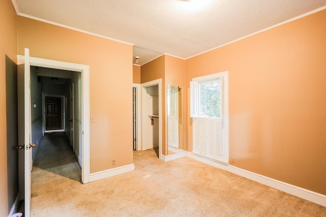 1867 N Old 179, Whigham, GA 39897 - unfurnished bedroom with carpet, crown molding, and a textured ceiling