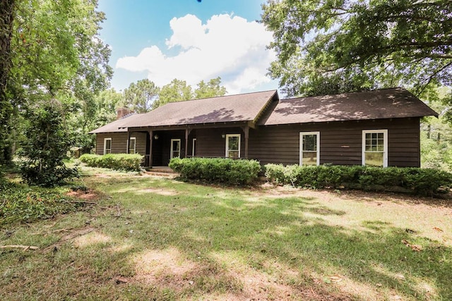 1867 N Old 179, Whigham, GA 39897 - ranch-style home with a front yard, covered porch, and a chimney