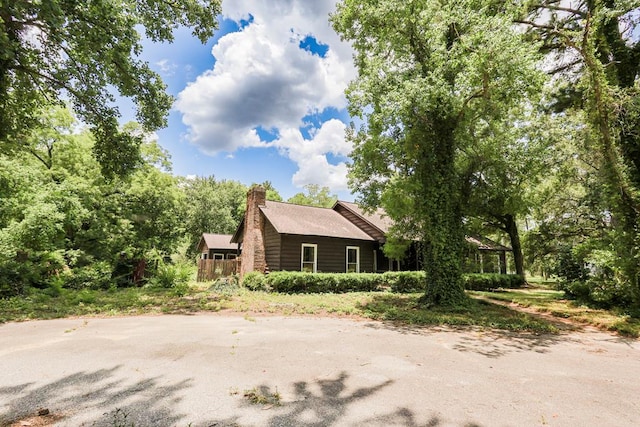 1867 N Old 179, Whigham, GA 39897 - view of property exterior featuring a chimney