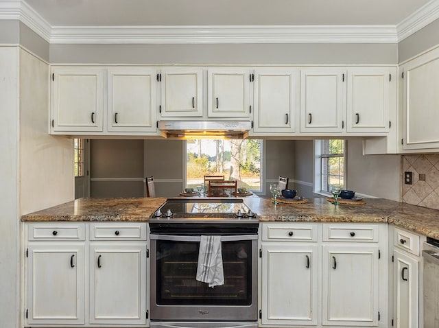 kitchen featuring appliances with stainless steel finishes, tasteful backsplash, ornamental molding, stone countertops, and white cabinets