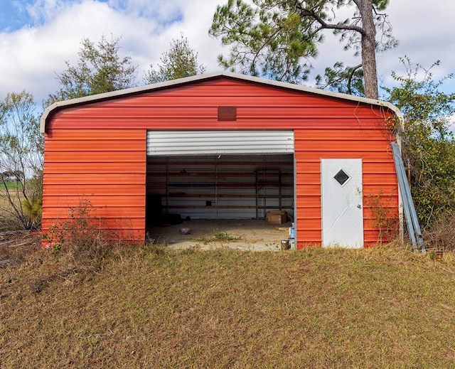 view of outdoor structure featuring a yard