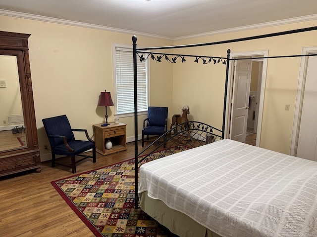 1420 Parallel Dr NW, Cairo, GA 39828 - bedroom featuring wood finished floors, baseboards, and ornamental molding
