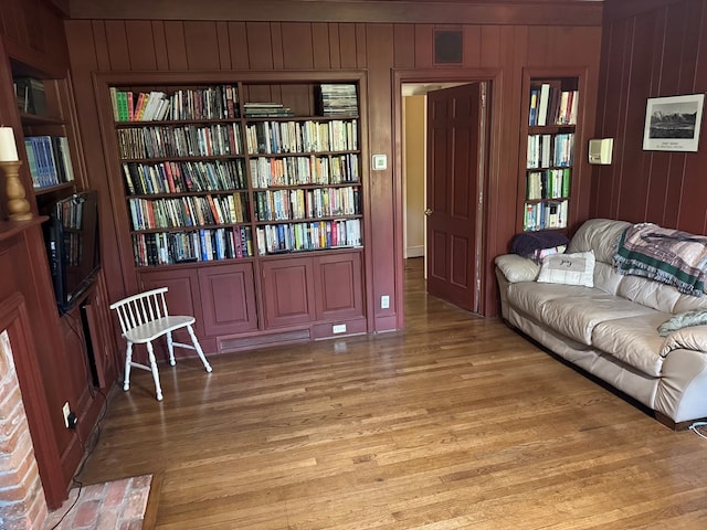 1420 Parallel Dr NW, Cairo, GA 39828 - living area featuring visible vents, wood finished floors, and wooden walls