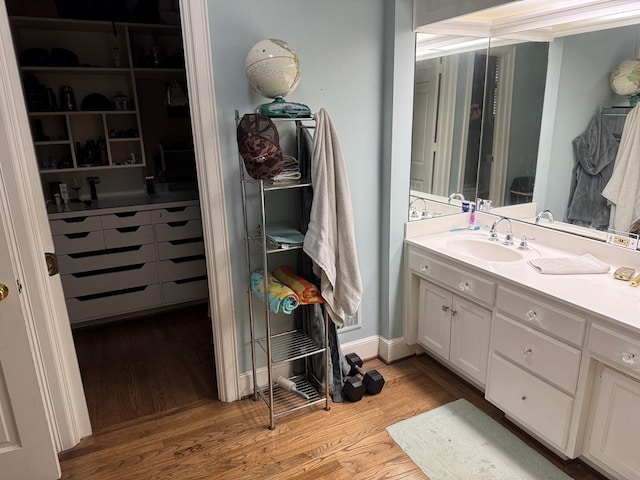 1420 Parallel Dr NW, Cairo, GA 39828 - bathroom featuring wood finished floors and vanity