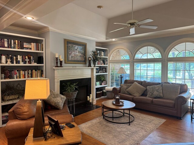2451 Lake Douglas Rd, Bainbridge, GA 39819 - living room with ornamental molding, a ceiling fan, a fireplace with flush hearth, wood finished floors, and recessed lighting