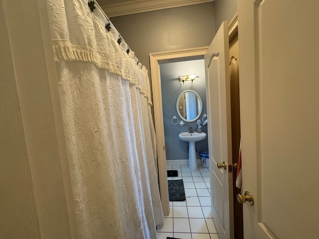 2451 Lake Douglas Rd, Bainbridge, GA 39819 - bathroom featuring tile patterned floors, a sink, and crown molding