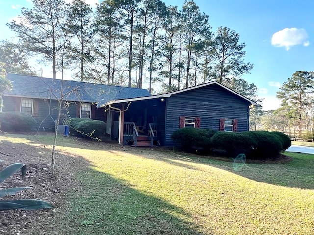 exterior space featuring a front lawn