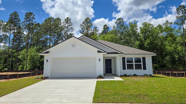 340 Michaels Way, Bainbridge, GA 39819 - ranch-style house featuring an attached garage, driveway, and roof with shingles
