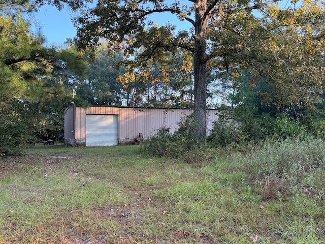 view of outdoor structure featuring a garage