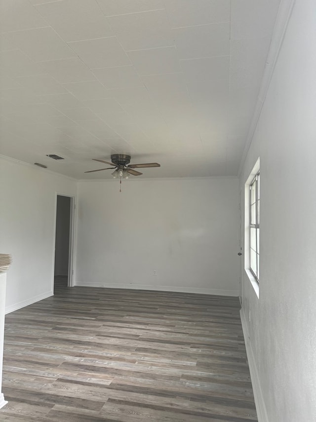 1008 Ga Highway 93 N, Cairo, GA 39827 - unfurnished room with a ceiling fan, ornamental molding, wood finished floors, and baseboards