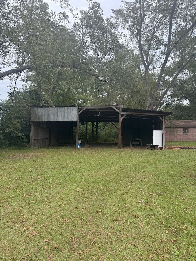 view of yard with a carport