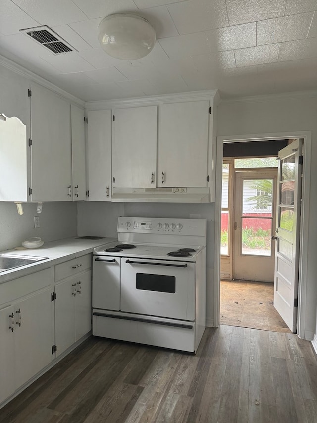 kitchen with white electric range, dark hardwood / wood-style floors, white cabinetry, and sink