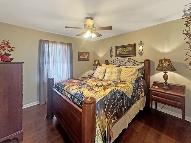 bedroom with ceiling fan and dark hardwood / wood-style flooring