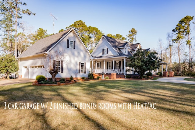 view of front of home featuring a garage, covered porch, concrete driveway, and a front yard