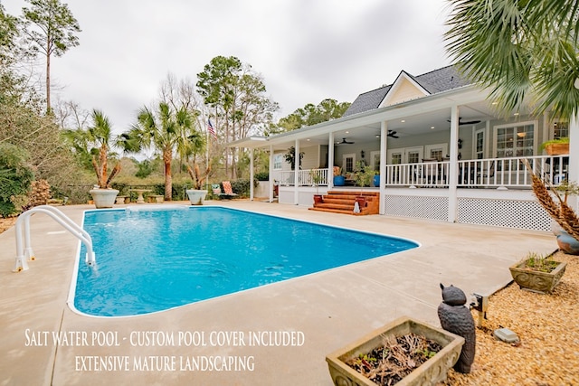 view of swimming pool featuring a ceiling fan, a fenced in pool, and a patio