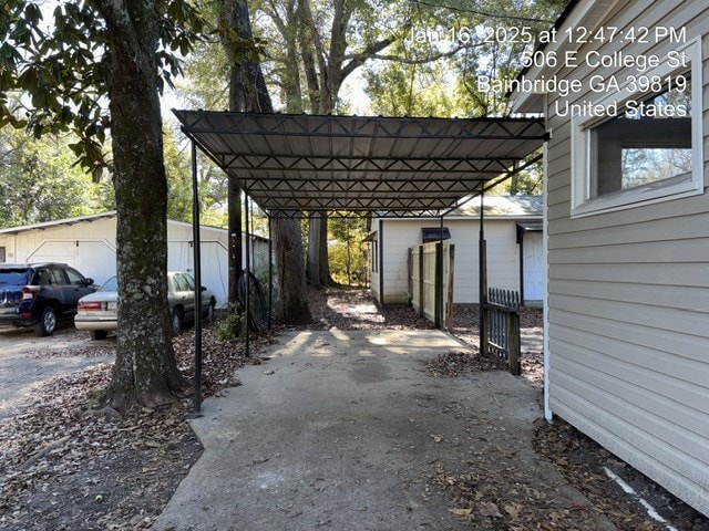 view of patio featuring a carport