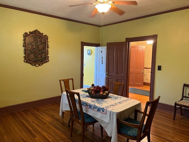 40 SW 5th Ave, Cairo, GA 39828 - dining space with wood finished floors, ceiling fan, crown molding, and baseboards