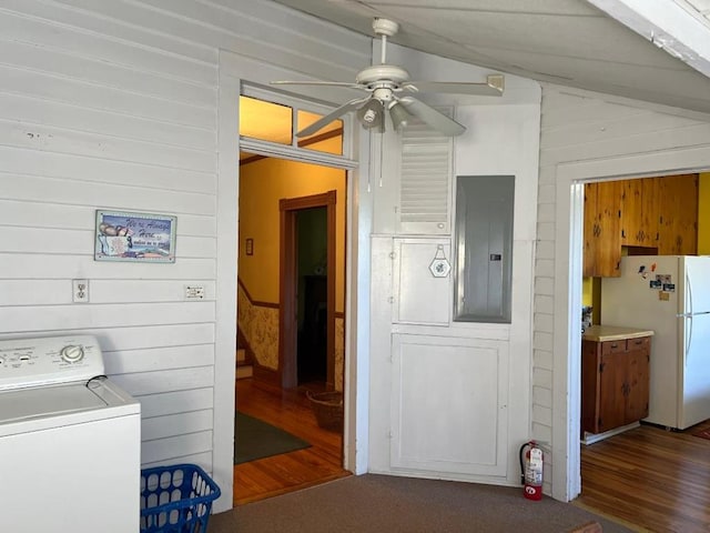 40 SW 5th Ave, Cairo, GA 39828 - washroom with washer / dryer, wood finished floors, electric panel, a ceiling fan, and wood walls