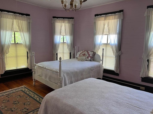 40 SW 5th Ave, Cairo, GA 39828 - bedroom with a chandelier, multiple windows, and wood finished floors