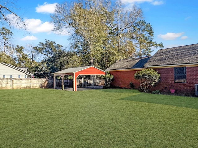 view of yard with a carport