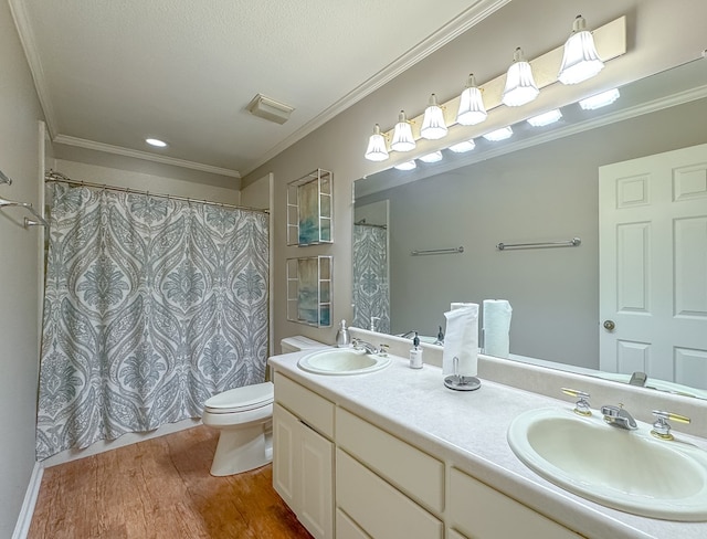 full bath featuring ornamental molding and a sink